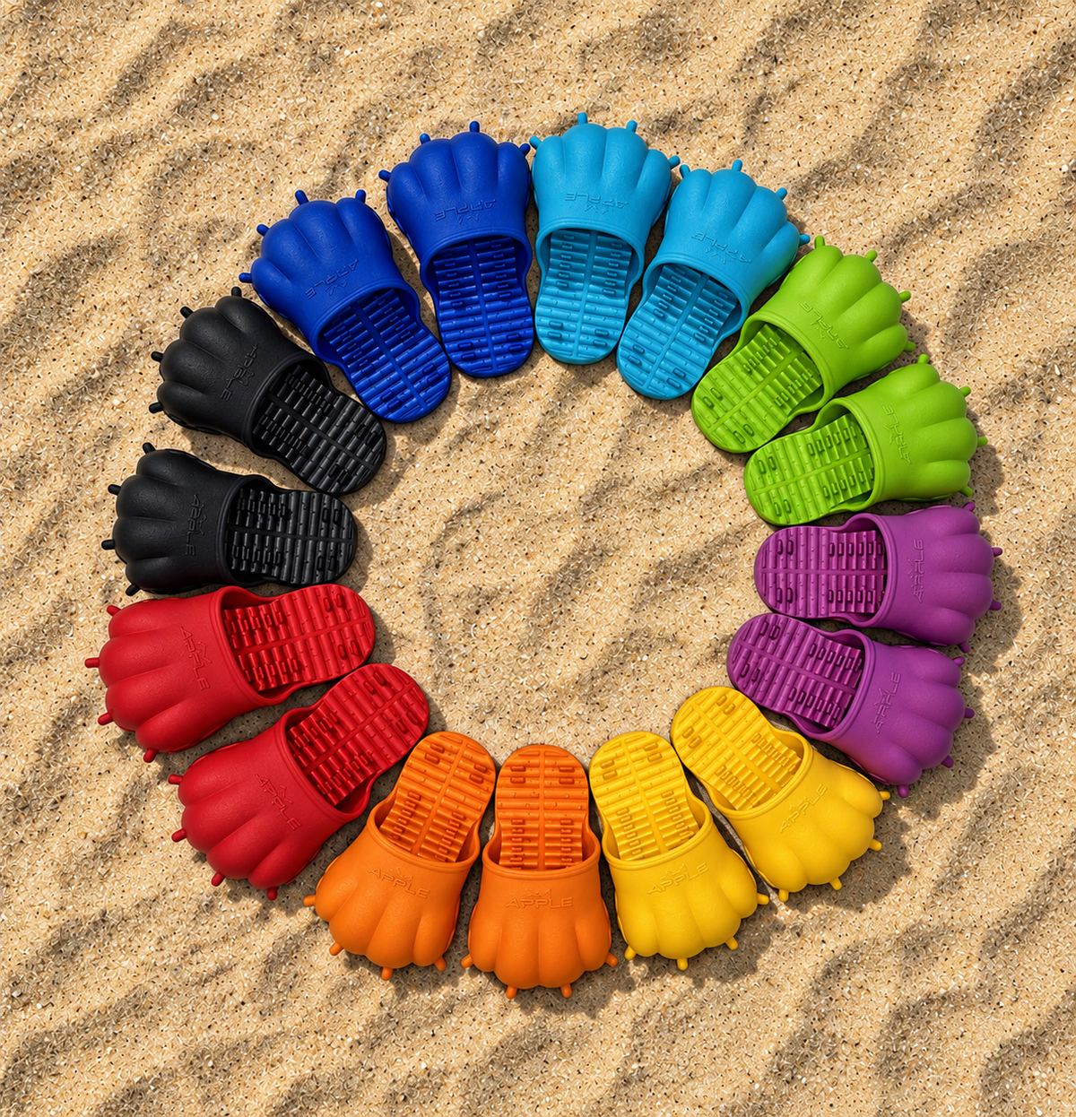 Colorful claw slides arranged in a circle on sand